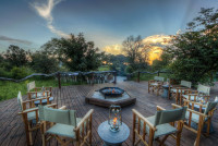 An evening around the fire, overlooking the Khwai river